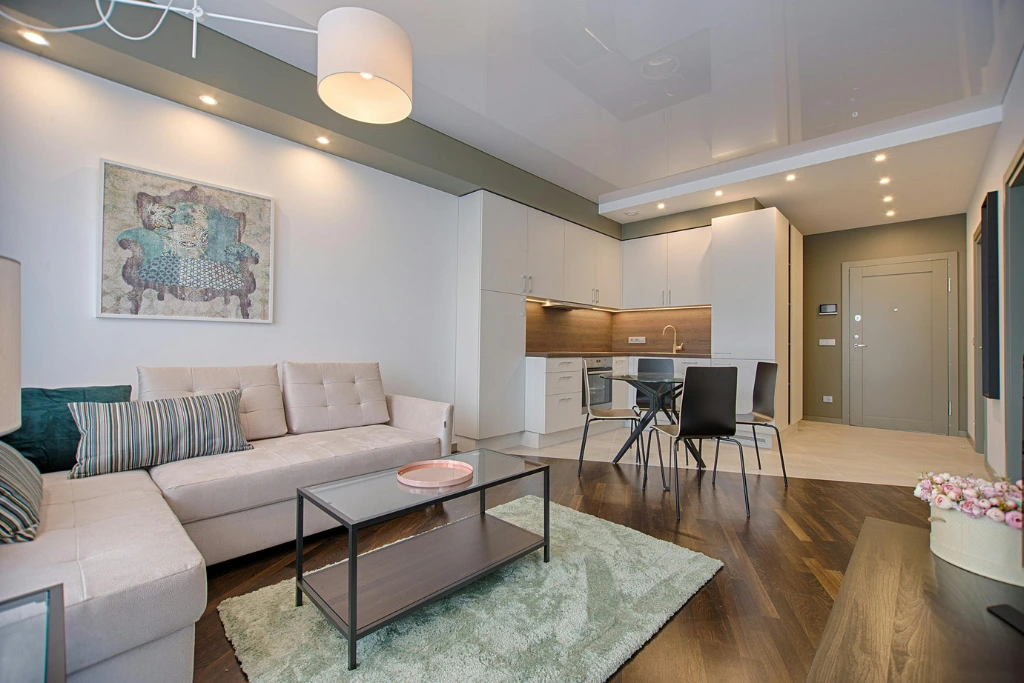 Modern living room and kitchen interior design by SRV Interiors the best interior designer in mumbai and home decorator and civil contractor